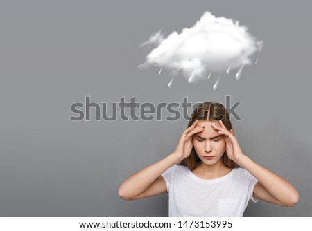 Rainy weather icon and girl with terrible headache on gray background, copy space