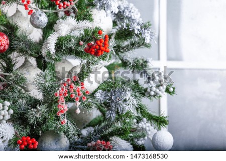 brightly and beautifully decorated Christmas tree branches