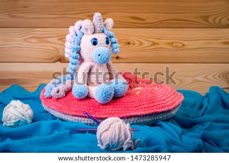 crocheted soft toy unicorn, amigurumi