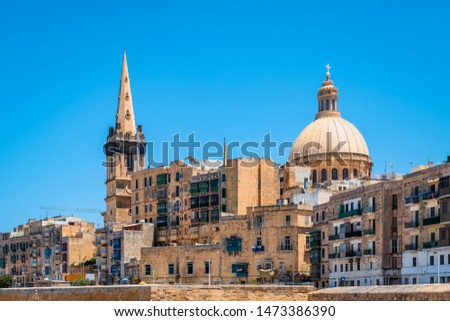 View of cathedral and bell tower in old city centre of Valletta, Malta.