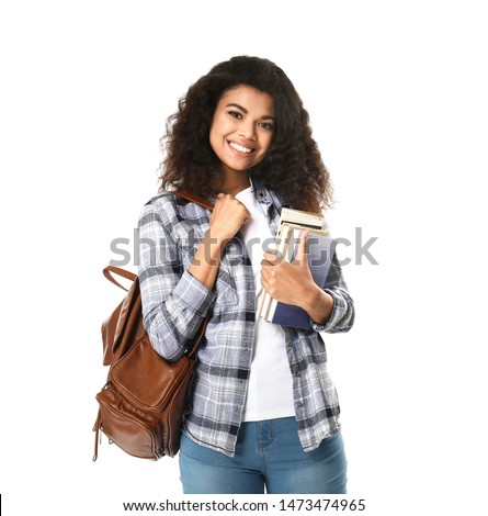 Portrait of cute African-American student on white background