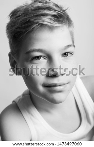Teenager boy. Black and white photo. Portrait. 
