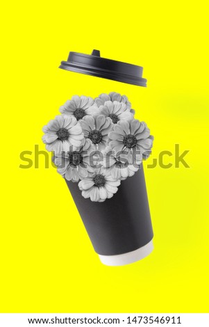 Funny art collage. Concept paper cup and flowers on yellow background.