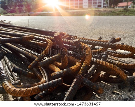 Rebar that has been modified for building construction Educational institutions that are wide in size On the background, construction area Completed and the sun shone