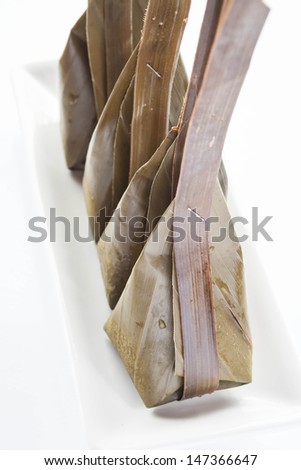 Steamed flour with coconut filling on white dish, stock photo