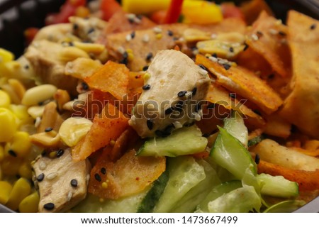 Boiled chicken meat and fresh vegetables, close up