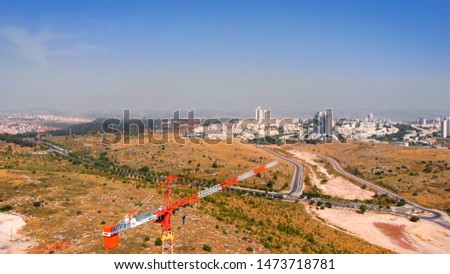 Construction Site and Modiin City Aerial view
Flight shot from the city of Modiin In Israel with Construction site 
