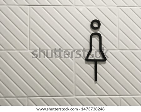Toilet sign for lady. Black line woman symbol on white background.