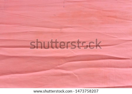 Crumpled pink fabric background Should receive laundry