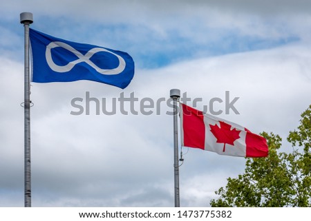 The Metis Flag and the Canadian Flag at Batoche, Saskatchewan. 