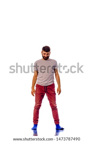 Handsome guy prepare for breakdancing on white background