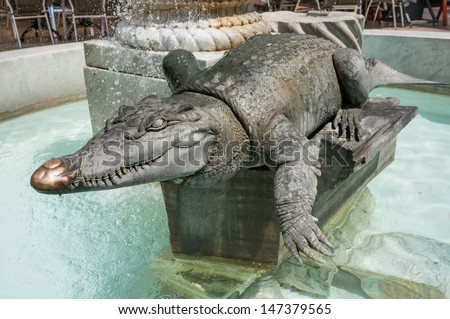 bronze Statue of crocodile, emblem of Nimes, France