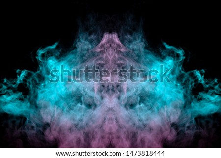Abstract pattern of green and pink smoke with flames on a black background
