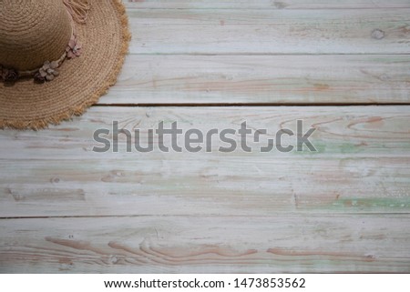 The picture placement the sea concept. Holiday travel Vacation Relaxation Power up. There is a hat for woman. Wooden background.