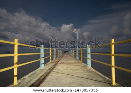 Perspective of The bridge in the night with clouds
