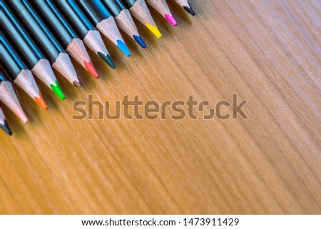 multicolored pencils on the table
