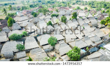 Sade village is a traditional village of sasak tribe in Lombok, Indonesia  Royalty-Free Stock Photo #1473956357
