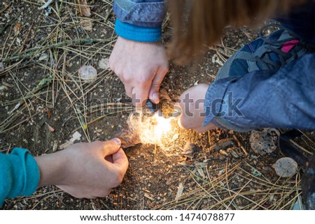 Children make fire without matches