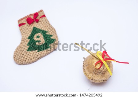 Christmas toy and sock on a white background