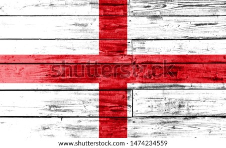 England flag painted on wooden background, closeup.