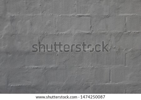 Grey concrete wall texture that made by cement brick.