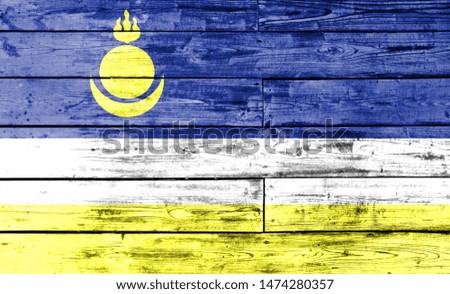 Buryatia flag painted on wooden background, closeup.