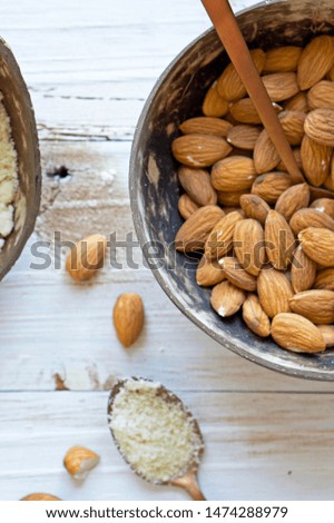 Top view of almonds and almond flour 