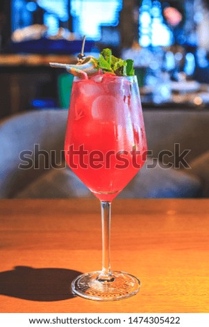 Refreshing Ice Cold Strawberry Lemonade whith mint and chewing candy at the restaurant