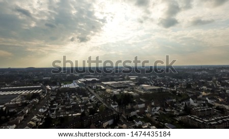Areal shot of Mönchengladbach in the west  of Germany with a cloudy sky