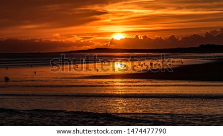 Sunset at Burry Port beach Carmarthenshire Wales UK