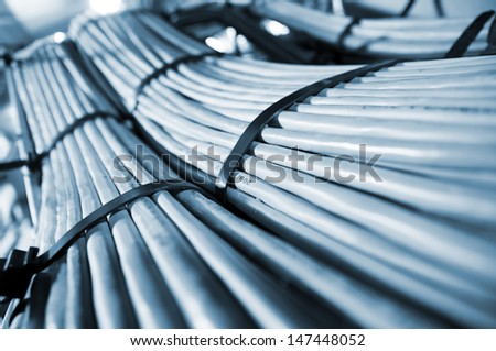 Network and power cables, abstract flow of information in internet networks Royalty-Free Stock Photo #147448052