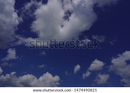 Clouds in the blue sky with sun clearance, for background and screen saver
