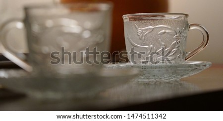 Close up of tea cups laid on table