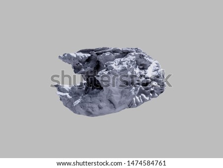 Stone meteorite on an isolated gray background.