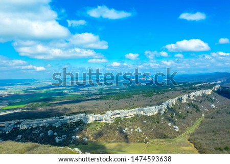 Beautiful mountain landscape near the cave city Eski-Kermen, near the city of Bakhchisaray, Crimea. Aerial drone shot