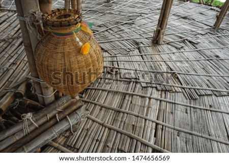 Traditional Thai woven bamboo container for caught fish.