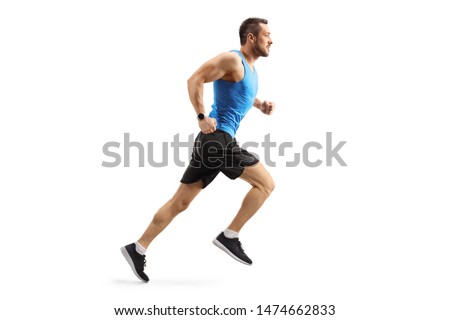 Full length shot of a young man in sportswear running isolated on white background Royalty-Free Stock Photo #1474662833
