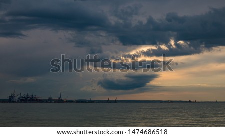 Dark clouds over a seaport in Gdansk.