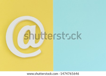 Email symbol on blue yellow background. Concept for email, internet, networking, email marketing communication or contact us