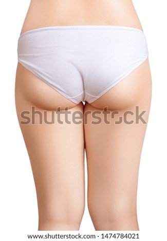 Fatty female buttocks after slimming and dieting. Isolated on white.