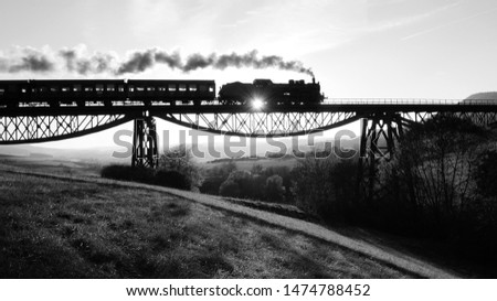 Old Historical Steam Engine Locomotive Train on Railroad Track Royalty-Free Stock Photo #1474788452