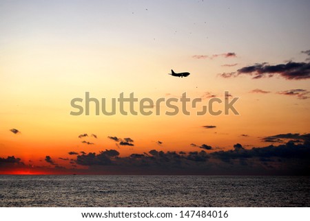 plane silhouette at sunset