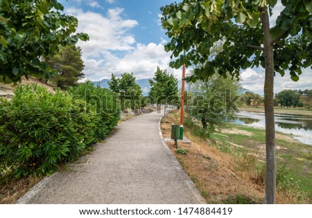 Narrow Alley passing along Viroi lake in Gjirokaster, Albania.