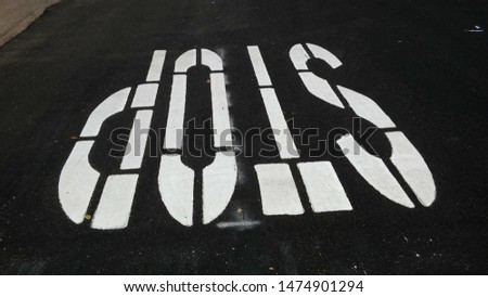 "Stop It's Upside Down! Pavement Stop Signs