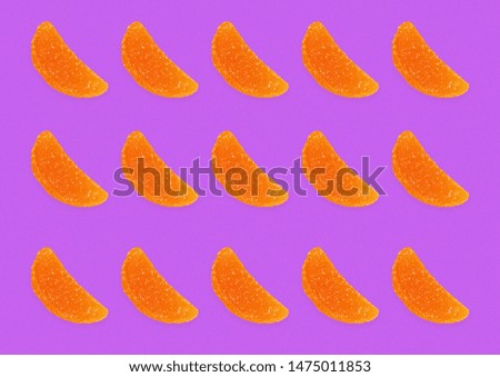 Delicious jelly candies with a colored background pattern