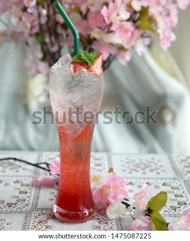 Strawberry Soda is a cool drink and beautiful color,happy and refreshing.The bright red color of the drink will makes your day.