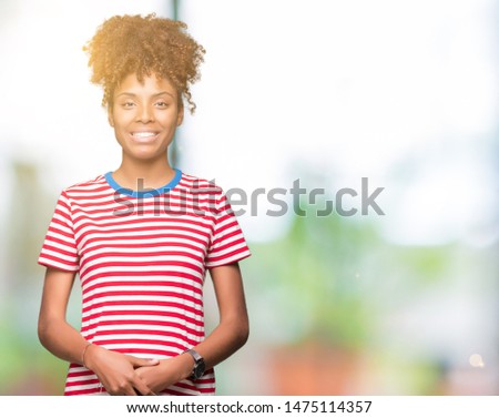 Beautiful young african american woman over isolated background Hands together and fingers crossed smiling relaxed and cheerful. Success and optimistic