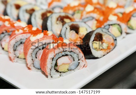 background of various kind of sushi and maki
