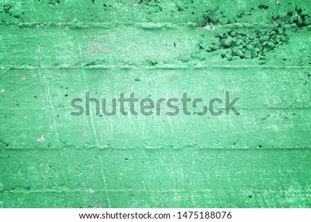 Grunge background. Green rough wall. Background texture.