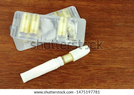 Cigarette nicotine replacement inhaler and cartridges Royalty-Free Stock Photo #1475197781
